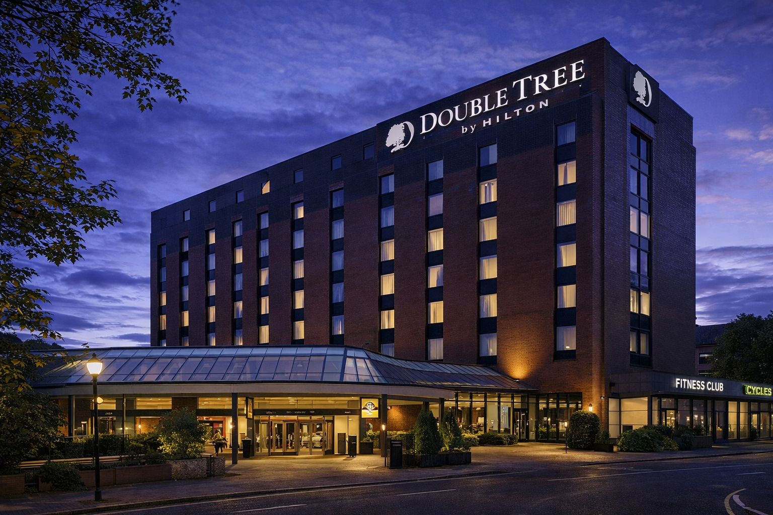 DoubleTree by Hilton Glasgow Exterior – Wedding & Event Venue DoubleTree by Hilton Glasgow hotel exterior at twilight in city centre Scotland